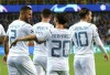 Manchester City's Kyle Walker, left, is congratulated by Manchester City's Bernardo Silva, center, after scoring his sides third goal during the Champions League Group A soccer match between Club Brugge and Manchester City at the Jan Breydel stadium in Bruges, Belgium, Tuesday, Oct. 19, 2021. (AP Photo/Olivier Matthys)