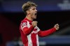 Atletico Madrid's Antoine Griezmann celebrates after scoring his team second goal during the Champions League Group B soccer match between Atletico Madrid and Liverpool at Wanda Metropolitano stadium in Madrid, Spain, Tuesday, Oct. 19, 2021. (AP Photo/Manu Fernandez)