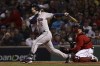 Houston Astros' Alex Bregman watches his home run against the Boston Red Sox during the second inning in Game 4 of baseball's American League Championship Series Tuesday, Oct. 19, 2021, in Boston. (AP Photo/Winslow Townson)