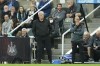 Newcastle's head coach Steve Bruce, centre, watches the play during an English Premier League soccer match between Newcastle and Tottenham Hotspur at St. James' Park in Newcastle, England, Sunday Oct. 17, 2021. (AP Photo/Jon Super)