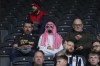 Newcastle fans wait for the start of an English Premier League soccer match between Newcastle and Tottenham Hotspur at St. James' Park in Newcastle, England, Sunday Oct. 17, 2021. Newcastle plays its first game under new ownership after the club was bought out last week by Saudi Arabia's sovereign wealth fund. (AP Photo/Jon Super)
