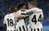 Juventus' Dejan Kulusevski, right, celebrates with teammates after scoring his side's opening goal during the Champions League group H soccer match between Zenit St. Petersburg and Juventus at the Gazprom Arena in St.Petersburg, Russia, Wednesday, Oct. 20, 2021. (AP Photo/Dmitry Lovetsky)