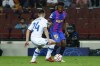 Barcelona's Ansu Fati, left, challenges for the ball with Dynamo Kyiv's Oleksandr Tymchyk during a Champions League group E soccer match between F.C. Barcelona and Dinamo Kyiv at Camp Nou stadium in Barcelona, Spain, Wednesday, Oct. 20, 2021. (AP Photo/Joan Monfort)