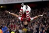 Arsenal's Pierre-Emerick Aubameyang celebrates after scoring the opening goal during the English Premier League soccer match between Arsenal and Crystal Palace at the Emirates Stadium in London, England, Monday Oct. 18, 2021. (Adam Davy/PA via AP)