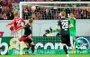 Mainz striker Jonathan Burkhardt scores his side's third goal on a header during the German Bundesliga soccer match between Augsburg and Mainz, at the Mewa Arena in Mainz, Germany, Friday, Oct. 22, 2021. (Uwe Anspach/dpa via AP)