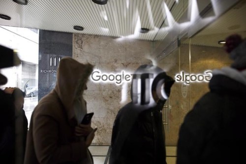Google Canada employees return to the Google office in Toronto following a walkout in Toronto on Thursday, Nov. 1, 2018.&nbsp;Canada's Competition Bureau says it has obtained a court order that will advance its investigation into Google's online advertising business. THE CANADIAN PRESS/Cole Burston