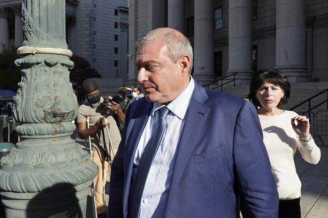 Lev Parnas leaves Federal court, in New York, Friday, Oct. 22, 2021. A New York jury convicted Parnas, a former associate of Rudy Giuliani on Friday of charges that he made illegal campaign contributions to influence U.S. politicians and advance his business interests. (AP Photo/Richard Drew)