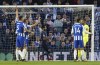 Manchester City's Ilkay Gundogan, center, scores their side's first goal of the game during the English Premier League soccer match between Brighton and Hove and Manchester City at the AMEX Stadium, Brighton, London, Saturday, Oct. 23, 2021. (Gareth Fuller/PA via AP)