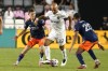 Inter Miami forward Federico Higuain (22) takes control of the ball as FC Cincinnati midfielder Kyle Scott (21) defends during the first half of an MLS soccer match Saturday, Oct. 23, 2021, in Fort Lauderdale, Fla. (AP Photo/Marta Lavandier)