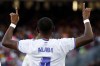 Real Madrid's David Alaba celebrates after scoring his sides first goal during the Spanish La Liga soccer match between FC Barcelona and Real Madrid at the Camp Nou stadium in Barcelona, Spain, Sunday, Oct. 24, 2021. (AP Photo/Joan Monfort)