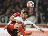 Union Berlin's Paul Jaeckel, left, and Stuttgart's Wahid Faghir battle for the ball during the Bundesliga soccer match between VfB Stuttgart and FC Union Berlin in the Mercedes-Benz Arena, Stuttgart, Germany, Sunday Oct. 24, 2021. (Silas Stein/dpa via AP)