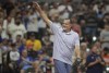 FILE - Milwaukee Brewers advisor to the coaching staff Ed Sedar waves to fans before a baseball game against the San Francisco Giants in Milwaukee, in this Saturday, Aug. 7, 2021, file photo. Longtime Milwaukee Brewers coach Ed Sedar has retired after a 30-year career with the organization. “It’s been a great ride,” Sedar said Monday, Oct. 25, 2021, in a statement. (AP Photo/Aaron Gash, File)