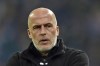 FILE - In this Dec. 4, 2015 file photo Hannover's head coach Michael Frontzeck watches his bench during the German Bundesliga soccer match between FC Schalke 04 and Hannover 96 in Gelsenkirchen, Germany. Frontzeck becomes interim coach VfL Wolfsburg. (AP Photo/Martin Meissner, file)