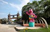 FILE—In this file photo from Feb. 4, 2021, a pink statue of a hippo greets tourists at Hacienda Napoles Park in Puerto Triunfo, Colombia. Hacienda Napoles was once a private zoo with illegally imported animals that belonged to drug trafficker Pablo Escobar. A U.S. court order says the offspring of hippos once owned by Escobar can be recognized as people with legal rights in the U.S. The case involves a lawsuit against the Colombian government over whether to kill or sterilize the hippos whose numbers are growing at a fast pace. (AP Photo/Fernando Vergara, File)