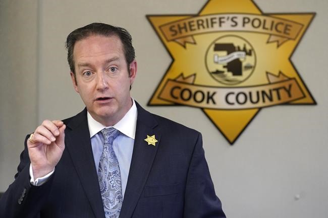 Cook County Sheriff's Detective Lt. Jason Moran responds to a question after Sheriff Tom Dart announced the identity of