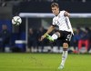 Germany's Joshua Kimmich plays the ball during the World Cup 2022 group J qualifying soccer match between Germany and Romania in Hamburg, Germany, Friday, Oct. 8, 2021. (Michael Sohn/dpa via AP)