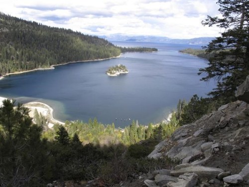 The shoreline is receding at Emerald Bay on the southwest corner of Lake Tahoe on Oct. 20, 2021 east of South Lake Tahoe, Calif. Drought fueled by climate change has dropped Lake Tahoe below its natural rim and halted flows into the Truckee River. President Joe Biden heads to a vital U.N. climate change summit at a time when a majority of Americans regard the deteriorating climate as a problem of high importance to them. That's the finding of a new poll by the Associated Press and the NORC Center for Public Affairs Research and the Energy Policy Institute at the University of Chicago. (AP Photo/Scott Sonner)