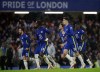 Chelsea players celebrate celebrate after the penalty shootout during the English League Cup fourth round soccer match between Chelsea and Southampton, at Stamford Bridge Stadium in London, Tuesday, Oct. 26, 2021. (AP Photo/Ian Walton)