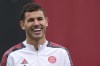 FC Bayern Munich's Lucas Hernandez laughs during a training session in Munich, Germany, Tuesday, Oct. 19, 2021. Bayern will face Portuguese team Benfica in Lisbon for a Champions League group E soccer match on Wednesday, Oct. 20, 2021. (AP Photo/Matthias Schrader)