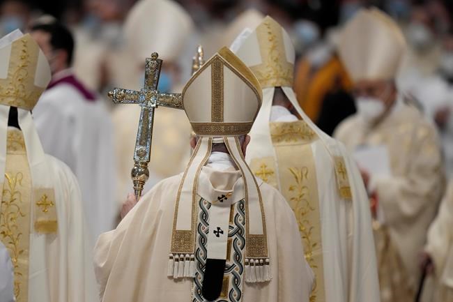 Pope Francis leaves at the end of a mass in which he ordained as bishops Andres Gabriel Ferrada Moreira and Guido Marini, in St. Peter's Basilica at the Vatican, Sunday, Oct. 17, 2021. The Vatican says Pope Francis is willing to visit Canada, as Indigenous leaders call on him apologize for the Catholic Church's role in residential schools. THE CANADIAN PRESS/AP-Alessandra Tarantino