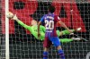 Barcelona's goalkeeper Marc-Andre ter Stegen dives to save on a shot by Rayo's Radamel Falcao during a Spanish La Liga soccer match between Rayo Vallecano and FC Barcelona at the Vallecas stadium in Madrid, Spain, Wednesday, Oct. 27, 2021. (AP Photo/Manu Fernandez)