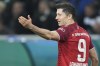 Bayern's Robert Lewandowski reacts during the German Soccer Cup match between Borussia Moenchengladbach and Bayern Munich at the Borussia Park in Moenchengladbach, Germany, Wednesday, Oct. 27, 2021. (AP Photo/Martin Meissner)