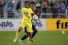 Nashville SC midfielder Randall Leal (8) traps the ball as FC Cincinnati defender Zico Bailey (16) defends in the first half of an MLS soccer match, Wednesday, Oct. 27, 2021, at TQL Stadium in Cincinnati.(Kareem Elagazzar/The Cincinnati Enquirer via AP)
