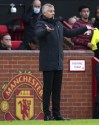 Manchester United's manager Ole Gunnar Solskjaer gestures as he stands on the touchline during the English Premier League soccer match between Manchester United and Liverpool at Old Trafford in Manchester, England, Sunday, Oct. 24, 2021. (Martin Rickett/PA via AP)