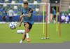 FILE - In this Aug. 10, 2021 file photo, Chelsea's Christian Pulisic kicks the ball during a training session at Windsor Park in Belfast, Northern Ireland. Chelsea says Christian Pulisic has resumed training ahead of Saturday's match at winless Newcastle. The 23-year-old Pulisic has not featured since Aug. 14 when he scored in Chelsea’s 3-0 win over Crystal Palace to open the league season. (AP Photo/Peter Morrison)