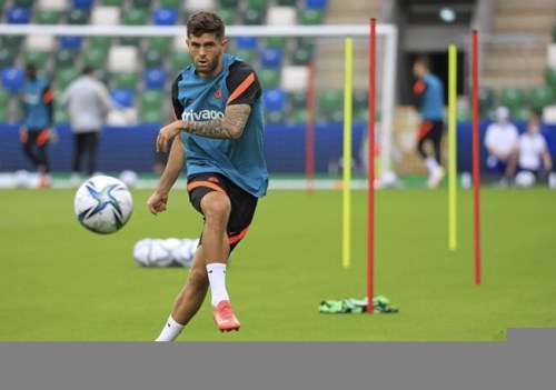 FILE - In this Aug. 10, 2021 file photo, Chelsea's Christian Pulisic kicks the ball during a training session at Windsor Park in Belfast, Northern Ireland. Chelsea says Christian Pulisic has resumed training ahead of Saturday's match at winless Newcastle. The 23-year-old Pulisic has not featured since Aug. 14 when he scored in Chelsea’s 3-0 win over Crystal Palace to open the league season. (AP Photo/Peter Morrison)