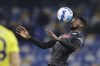 Napoli's Andra Zambo Anguissa stops the ball during the Italian Serie A soccer match between Napoli and Bologna at the Diego Armando Maradona stadium in Naples, Italy, Thursday, Oct. 28, 2021. (Alessandro Garofalo/LaPresse via AP)