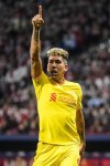 Liverpool's Roberto Firmino gestures during the Champions League Group B soccer match between Atletico Madrid and Liverpool at Wanda Metropolitano stadium in Madrid, Spain, Tuesday, Oct. 19, 2021. (AP Photo/Manu Fernandez)