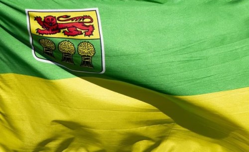 Saskatchewan's provincial flag flies on a pole in Ottawa on Monday, July 6, 2020. The Saskatchewan Public Safety Agency says residents will be required to provide proof of vaccination to enter hospitals and long term care homes as the province reports no decline in COVID-19 cases. THE CANADIAN PRESS/Adrian Wyld