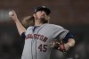 Houston Astros relief pitcher Ryne Stanek throws during the seventh inning in Game 3 of baseball's World Series between the Houston Astros and the Atlanta Braves Friday, Oct. 29, 2021, in Atlanta. (AP Photo/David J. Phillip)