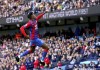 Crystal Palace's Wilfried Zaha celebrates scoring during the English Premier League soccer match between Manchester City and Crystal Palace at the Etihad Stadium, Manchester, England, Saturday Oct. 30, 2021. (Martin Rickett/PA via AP)