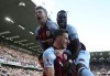 Burnley's Chris Wood celebrates with teammates, after scoring his side's first goal of the game, during the English Premier League match between Burnley and Brentford, at Turf Moor, in Burnley, England, Saturday, Oct. 30, 2021. (Nigel French/PA via AP)