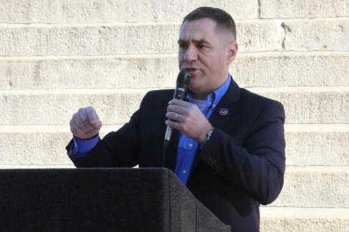Kansas state Rep. Pat Proctor, R-Leavenworth, speaks during a rally of people opposed to COVID-19 vaccine mandates outside the Kansas Statehouse, Saturday, Oct. 30, 2021, in Topeka, Kan. Republican lawmakers are looking for ways to resist the mandates. (AP Photo/John Hanna)