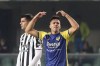 Verona's Giovanni Simeone celebrates past Juventus' Alvaro Morata after scoring during the Serie A soccer match between Hellas Verona and Juventus, at the Verona Bentegodi stadium, Italy, Saturday, Oct. 30, 2021. (Paola Garbuio/LaPresse via AP)