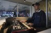 Atlanta Braves' organist Matthew Kaminski plays an organ overlooking Truist Field before Game 4 of baseball's World Series between the Houston Astros and the Atlanta Braves Saturday, Oct. 30, 2021, in Atlanta. Kaminski, the organist since the start of the 2009 season, has performed at more than 1,000 games and become a bit of a cult figure with the witty selections that he plays as walk-up music for opposing players. (AP Photo/Brynn Anderson)