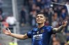 Inter Milan's Joaquin Correa celebrates after scoring his side's second goal during a Serie A soccer match between Inter Milan and Udinese, in Milan, Italy, Sunday, Oct. 31, 2021. (Spada/LaPresse via AP)