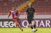 Forge FC's Alexander Achinioti-Jonsson, right, handles the ball in front of Santos de Guapiles' Brayan Lopez during CONCACAF League quarterfinal soccer action at the Nacional of Costa Rica stadium in San Jose, Costa Rica, in this October 20, 2021 handout photo. THE CANADIAN PRESS/HO - CONCACAF, STRAFFON IMAGES - JHON DURAN