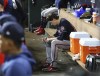Braves starter Max Fried sits dejected in the dugout during the 6th inning of a 7-2 loss to the Astros in game 2 of the World Series on Wednesday, Oct. 27, 2021, in Houston. (Curtis Compton/Atlanta Journal-Constitution via AP)