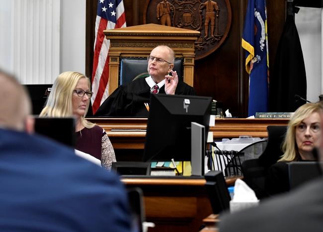 Judge Bruce Schroeder speaks to the attorneys before the jury is let into the room for Kyle Rittenhouse's trial at the Kenosha County Courthouse in Kenosha, Wis, on Monday, Nov. 2, 2021. Rittenhouse is accused of killing two people and wounding a third during a protest over police brutality in Kenosha, last year. (Sean Krajacic/The Kenosha News via AP, Pool)