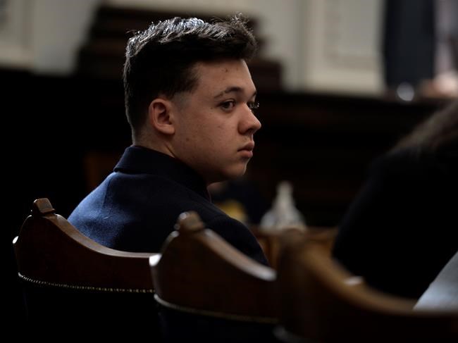 Kyle Rittenhouse listens as his lawyer gives opening statements to the jury at the Kenosha County Courthouse in Kenosha, Wis, on Monday, Nov. 2, 2021. Rittenhouse is accused of killing two people and wounding a third during a protest over police brutality in Kenosha, last year. (Sean Krajacic/The Kenosha News via AP, Pool)