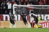 Lille's Jonathan Ikone, right, celebrates after scoring his side's second goal during the Champions League group G soccer match between Sevilla and Lille at the Ramon Sanchez Pizjuan stadium in Seville, Spain, Tuesday, Nov. 2, 2021. (AP Photo/Angel Fernandez)