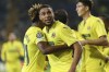 Villarreal's Arnaut Danjuma, centre, celebrates after scoring his side's second goal during a Group F Champions League soccer match between Villarreal and Young Boys at the Ceramica stadium in Villarreal, Spain, Tuesday, Nov. 2, 2021. (AP Photo/Alberto Saiz)
