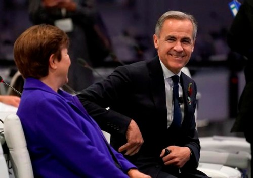 Former Bank of Canada governor Mark Carney smiles as he arrives for Britain's Chancellor of the Exchequer Rishi Sunak's speech at the COP26 U.N. Climate Summit in Glasgow, Scotland, Wednesday, Nov. 3, 2021. THE CANADIAN PRESS/AP-Alberto Pezzali