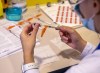 COVID-19 vaccine shots are prepared by registered nurse Allison Miley at the IWK Health Centre in Halifax on Monday, Feb. 22, 2021. THE CANADIAN PRESS/Andrew Vaughan