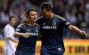 Los Angeles Galaxy's Robbie Keane, left, of Ireland, and Rob Friend celebrate Keane's goal against the Vancouver Whitecaps during second half MLS soccer action in Vancouver, B.C., on Saturday April 19, 2014. THE CANADIAN PRESS/Darryl Dyck