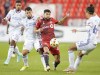 Toronto FC's Jonathan Osorio battles for the ball with FC Cincinnati's Luciano Acosta, left, and Florian Valot, right, during the first half of MLS soccer action in Toronto, Wednesday September 29, 2021.  THE CANADIAN PRESS/Mark Blinch